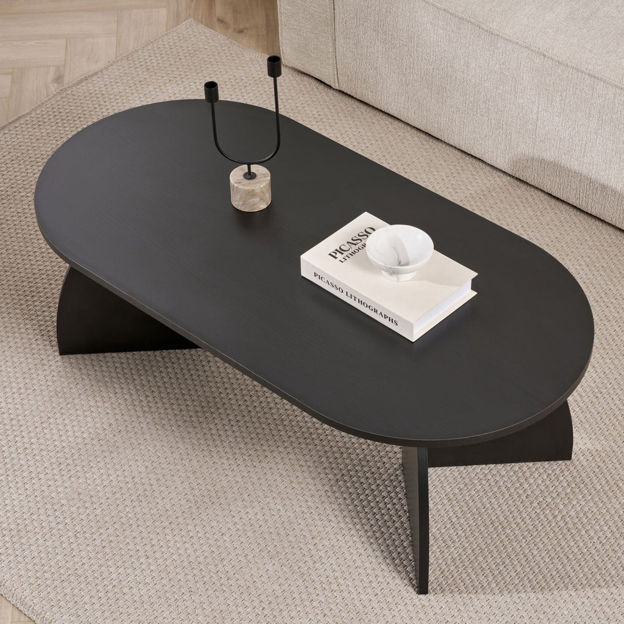 Melina Couchtisch oval aus Holz schwarz 120 cm Melaminbeschichteter Holzverbundstoff