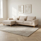 3-zits hoekbank Ezra stof beige sfeerfoto in modern interieur