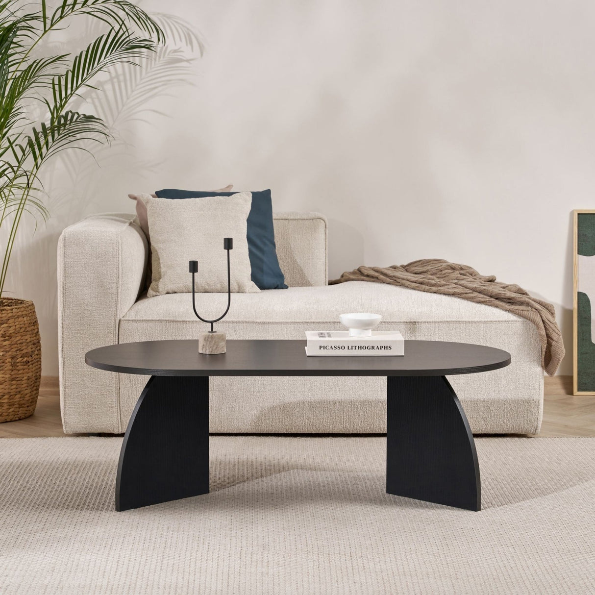 Melina Couchtisch oval aus Holz schwarz 120 cm Melaminbeschichteter Holzverbundstoff