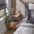 Nachttisch Paul DH Interior Akazie LxBxH 60x39x28 Akazienholz Stimmungsvolles Foto diagonale Vorderansicht